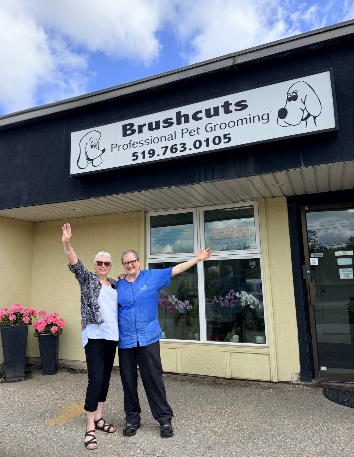 Sharonne and Sue, the owners of Brushcuts, welcoming you outside their Dawson Road salon in Guelph